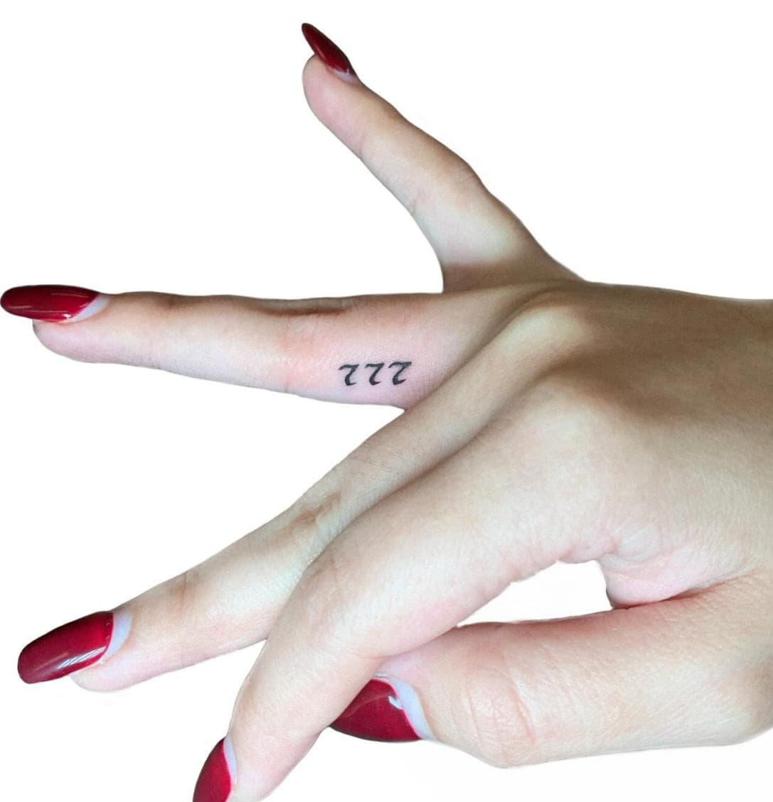 Tiny fine-line 777 on the side of a finger