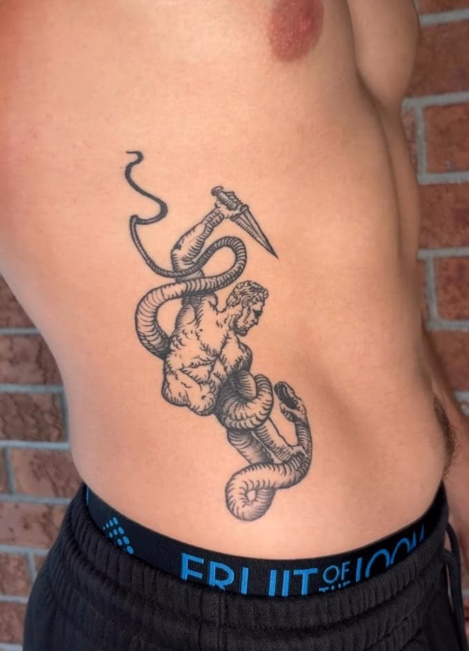 Sketch-style snake coiled around a dagger in fine black linework, on the ribs