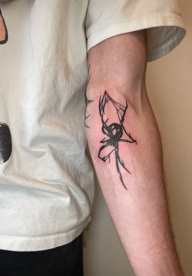 Expressive sketch-style spider with broken linework below an elbow